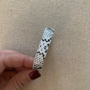 Snake print bracelet.